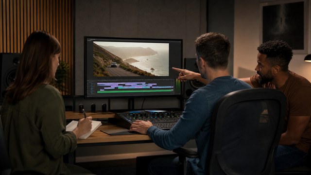 Client producer and editor reviewing a video together